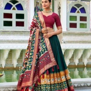 110_5518da62-2cd2-4064-8bbd-d54e02be9914-1.jpg Green Color Tussar Silk Patola Printed Lehenga Choli